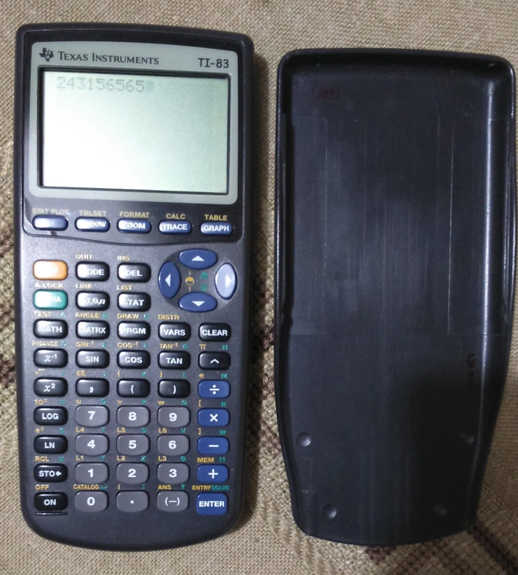 Texas Instruments TI-83 Graphing Calculator with High Contrast Display